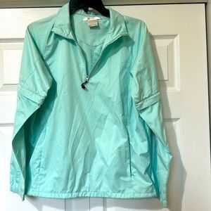 Light teal Nike Golf top
